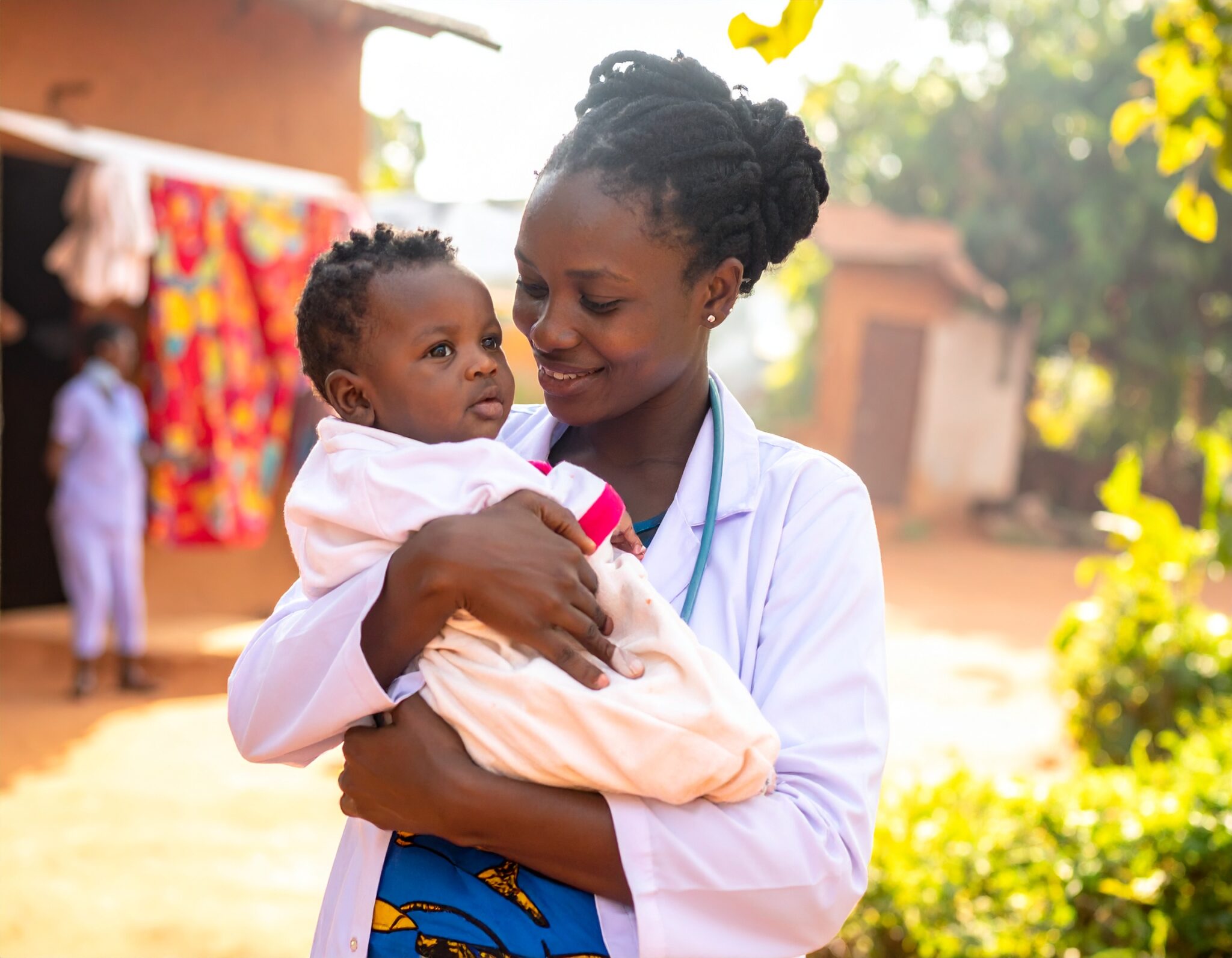 firefly an african mother in a rural village setting, gently cradling her newborn baby, surr 29891